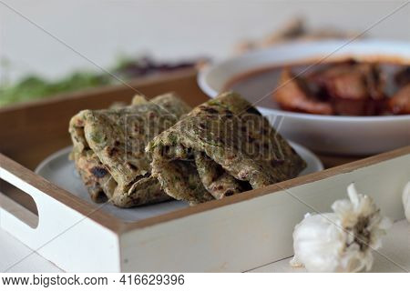 Indian Flatbread Made Of Whole Wheat Flour With Grounded Flaxseed And Fresh Coriander Leaves Served 