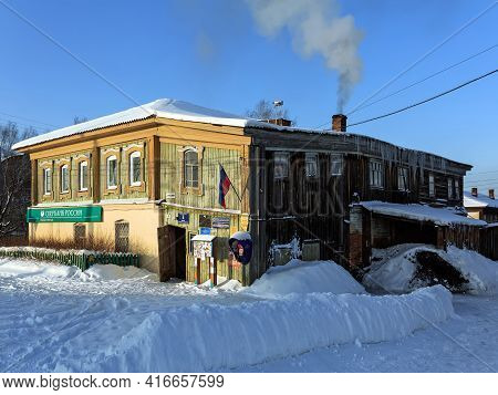 Visim, Russia - January 8, 2015. Country Street In Winter. Office Building Located In The Historical