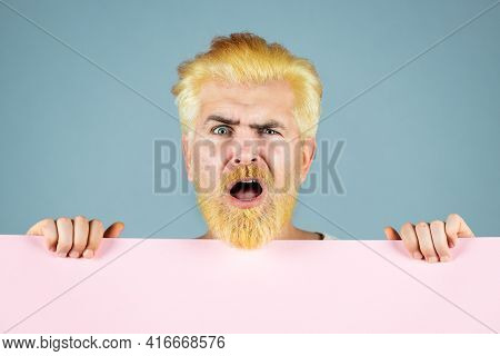 Funny Man Holding Blank Sheet. Discount. Smiling Man Holding Empty Blank Paper Board With Copy Space
