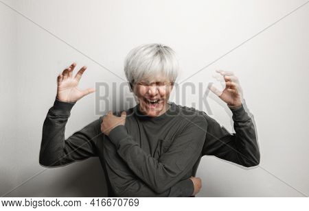 Conceptual Motion Blurred Photo Of Crazy Person. Bipolar Disorder. Mental Health And Psychology Conc