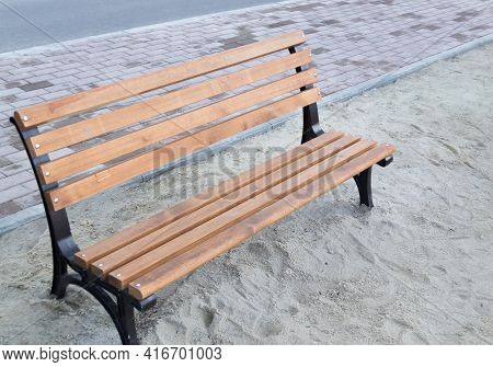A Lonely Sand Bench Lies Around. Quality Photo