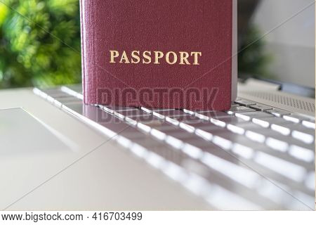 Passport On The Keyboard. Concept Of Online Identification When Registering On A Website On The Inte