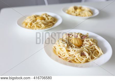 Cooked Dish With Pasta, Egg And Bacon