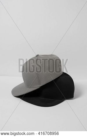 Set Of Blank Monochrome Gray And Black Baseball Cap Isolated Over White Background. Empty Snapback D