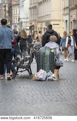 Full Street Trash Can In The Center Of The Year On The Pedestrian Zone, Selective Focus. Concept: Ec