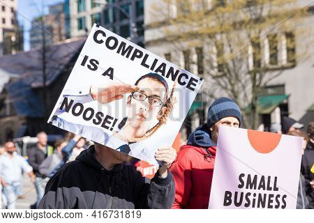 Downtown Vancouver, Bc, Canada - Apr 02, 2021: Anti Lockdown Protesters March In Protest Of Governme