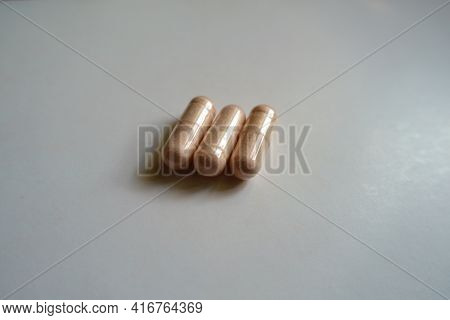 Vegetarian Pink Capsules Of Probiotic Dietary Supplement (three Items)