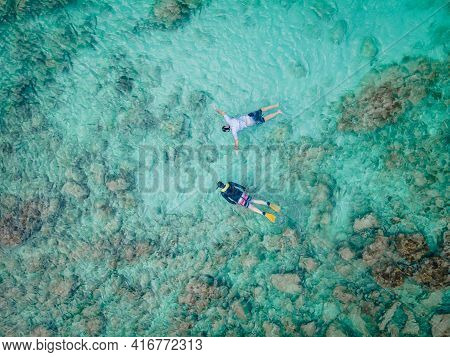 Eagle Beach Aruba, Palm Trees On The Shoreline Of Eagle Beach In Aruba, Drone View At A Beach With P