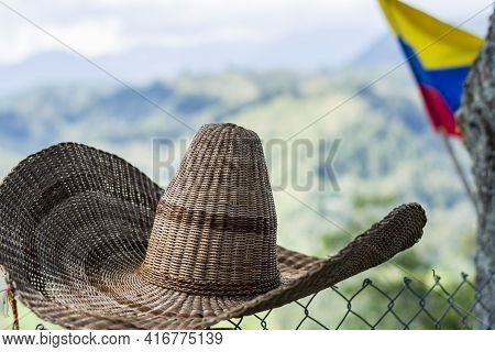 Traditional Colombian Hat With The Colombian Flag And The Mountains As A Background