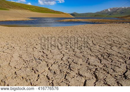 Spandaryan Reservoir In Armenia Under Blue Sky Background