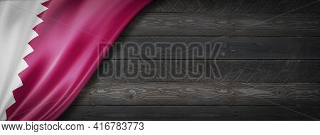Qatar Flag On Black Wood Wall. Horizontal Panoramic Banner. 3d Illustration