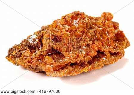 Macro Stone Mineral Wulfenite On A White Background