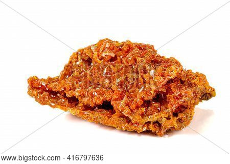 Macro Stone Mineral Wulfenite On A White Background