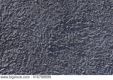 Relief Surface. Grey Wall, Texture, Background. Plastered Building Wall, Painted With Water-based Gr