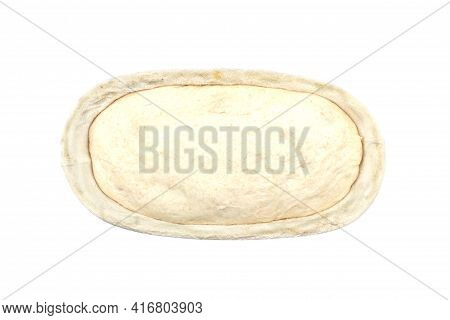 Sourdough Dough In Proofing Basket Isolated On White Background.
