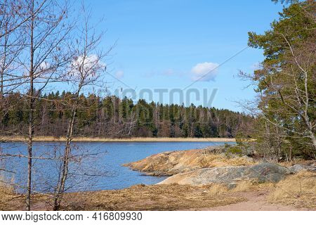 The Baltic Sea Coast In Finland In The Spring On A Sunny Day.