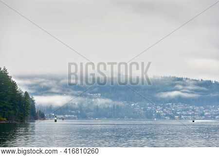 Burrard Inlet Mist Burnaby. Barnet Marine Park Shoreline. Burnaby, British Columbia, Canada.