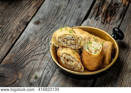 Russian Pancakes With Meat. Traditional Maslenitsa Meal. Homemade Filled By Chicken Meat Crepe Rolls