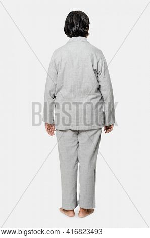 Senior woman in gray pajamas nightwear apparel full body
