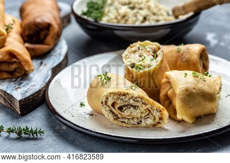 Hill Of Pancakes With Chicken Meat And Cheese. Traditional Maslenitsa Meal. Homemade Filled By Chick