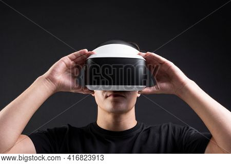 Man using virtual reality gadget for entertainment