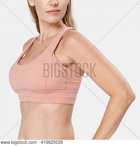 Woman wearing pink sports bra