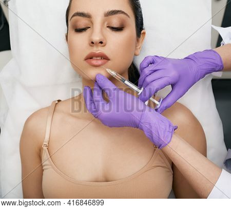 Lip Augmentation Procedure. Filler Injection For Beautiful Woman Lip Augmentation With Hyaluronic At