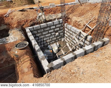 Closeup Of Construction Of New Building With Cement Block And M Sand Or Artificial Sand At Empty Fie