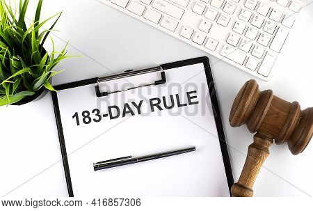 Calculator With Text 183 Day Rule On The Chart. Business, Finance Conceptual.