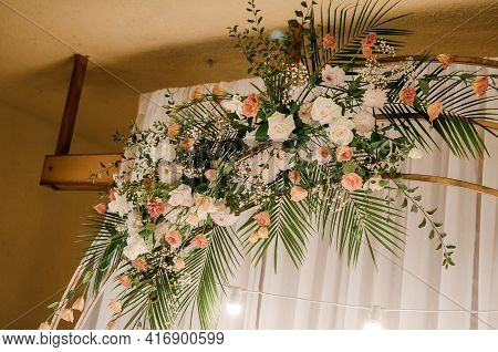 Wedding Arch With Multi-colored Flowers. Wedding Decorations
