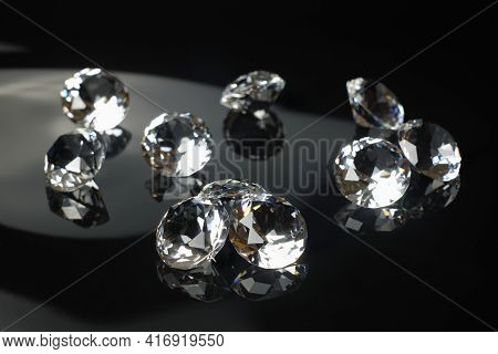 Several Excellent Pure Diamonds With Reflection On Black Mirror Background Close Up View Selective F