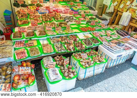 Tokyo, Japan - April 18, 2017: Stall With Crab Claws, Octopus And Fresh Fish In Ameya-yokocho Street