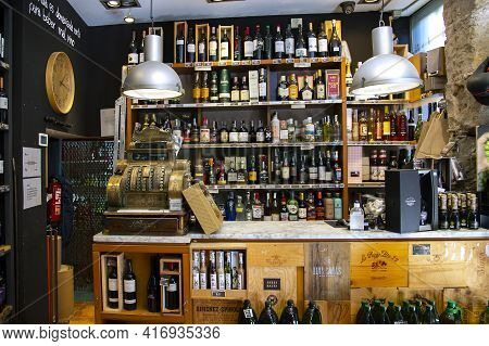Spain, Barcelona, March, 2021: Shelves With Various Of Wines From Various Vineyards In A Liquor Stor