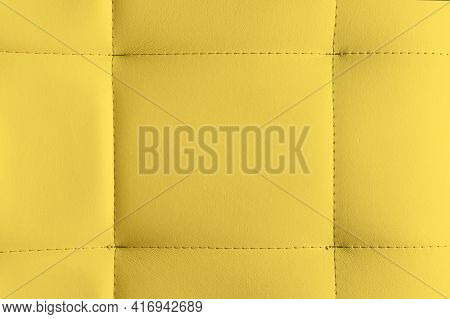 Yellow Leather Texture Background. Detailed Background Of Soft Furniture Leather Or Leatherette Surf