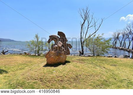 Jocotepec, Mexico - April 4 2021: Mayan Head Sculpture On The Jocotepec Boardwalk