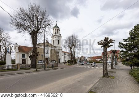 Janowiec Wlkp., Kujawsko-pomorskie Poland - April, 14, 2021: Catholic Temple In A Small Town. Church
