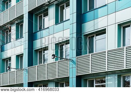 Blue Office Building With A Hinged Facade. Opaque Aluminium Panel. Panels. Details. Windows. Archite