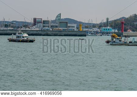 Pyeongtaek, South Korea; April 6, 2021: Fishing Boats Anchored Outside Of Breakwater At Jeongok Port