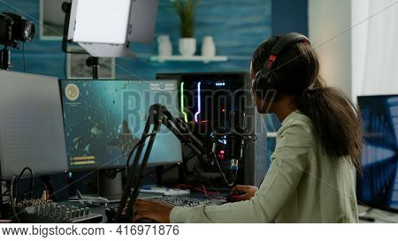 Professional E Sports Afro Gamer Talking On Microhone