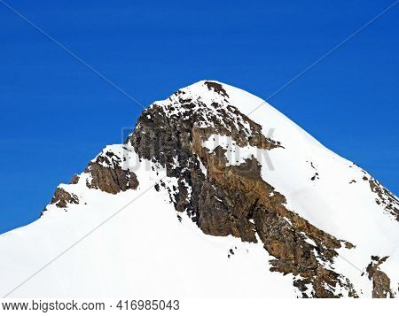 Snowy Alpine Mountain Peak Oldenhorn (oldehore Or Becca D\'audon) Located In A Mountain Massif Les D