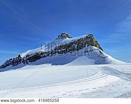 Snowy Alpine Mountain Peak Oldenhorn (oldehore Or Becca D\'audon) Located In A Mountain Massif Les D