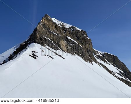 Snowy Alpine Mountain Peak Oldenhorn (oldehore Or Becca D\'audon) Located In A Mountain Massif Les D