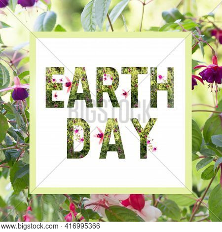 World Earth Day Concept. Lettering Earth Day With Plants And Wonderful Flowers