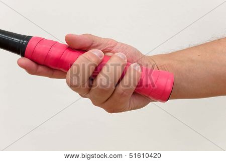 Holding a squash racket
