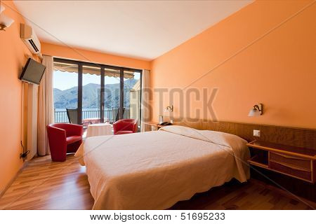 hotel room with exceptional views of the lake and mountains