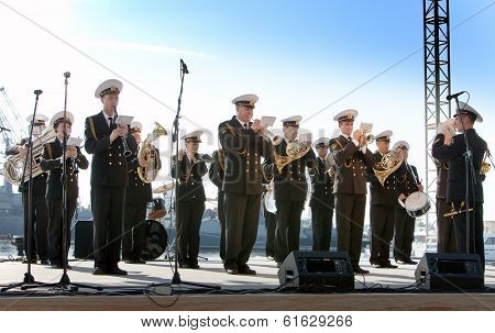 KRONSTADT RUSSIA - AUGUST 27: military band musicians perform on a city holiday devoted to the 150th