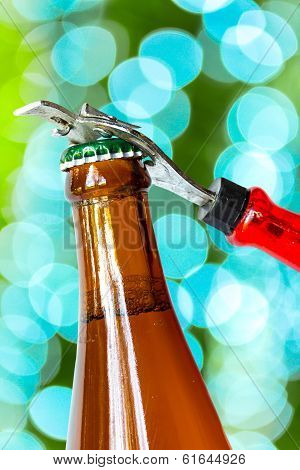 Opening Dark Beer Bottle With Metal Opener