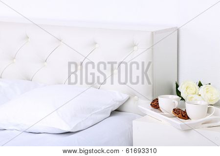 Comfortable soft bed with pillows
