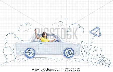 Young woman riding car made of list of paper