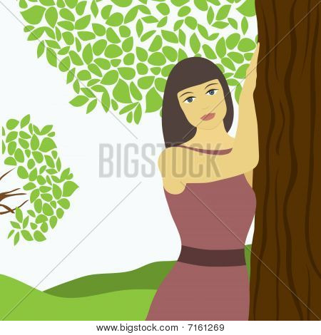 Ragazza vicino all'albero